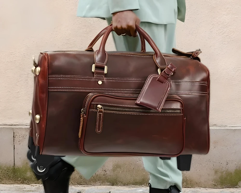 leather rolling carry on bag